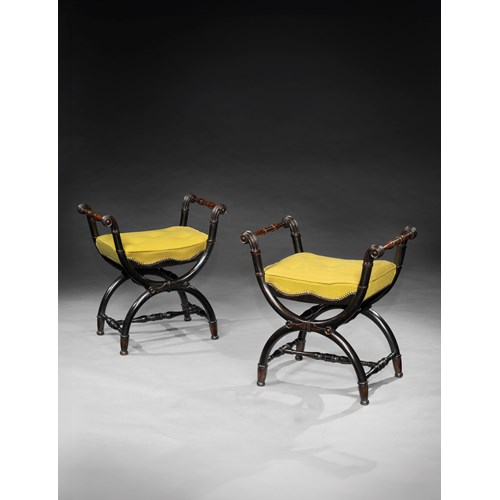 A Pair of Regency Period Ebonised Oak X Framed Stools